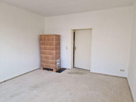 Wohnzimmer mit Kachelofen