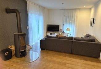 Wohnzimmer mit wohlwollendem Schwedenofen