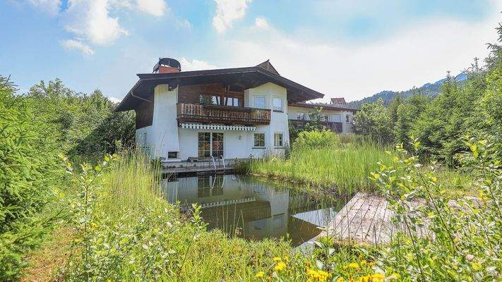 KITZIMMO-Grundstück mit Altbestand in sonniger Ruhelage kaufen - Immobilien Kirchberg.
