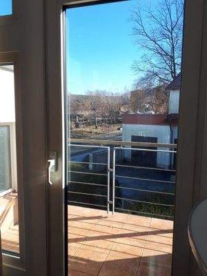 Büro mit Balkonzugang