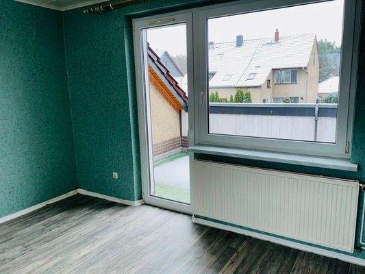 Schlafzimmer mit Balkon.jpeg