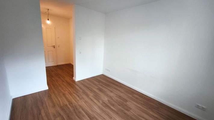 Schlafzimmer mit Ankleideraum