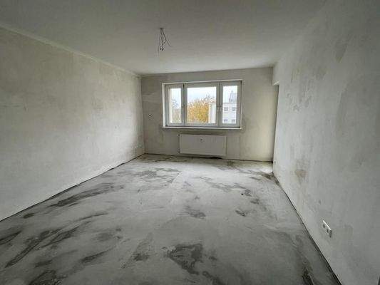 Wohnzimmer mit Balkon