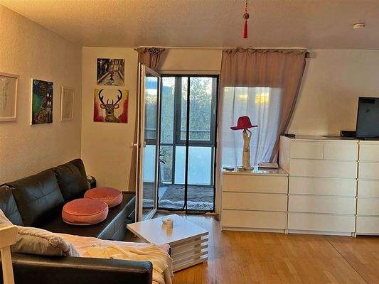 Wohnzimmer mit Wintergarten 