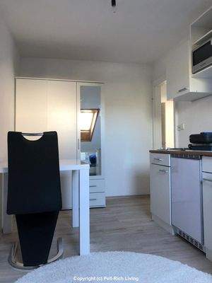 Wohnzimmer mit Küche