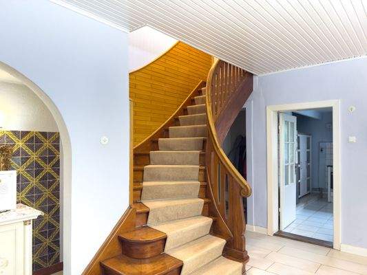 Treppe in das Obergeschoss