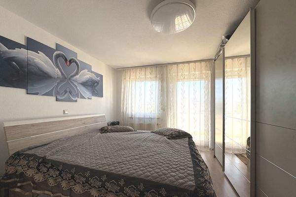 Schlafzimmer mit Balkon