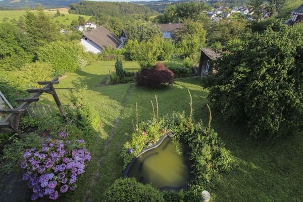 Aussicht vom Balkon in den eigenen Garten