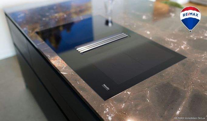 RE/MAX Immobilien DeLux