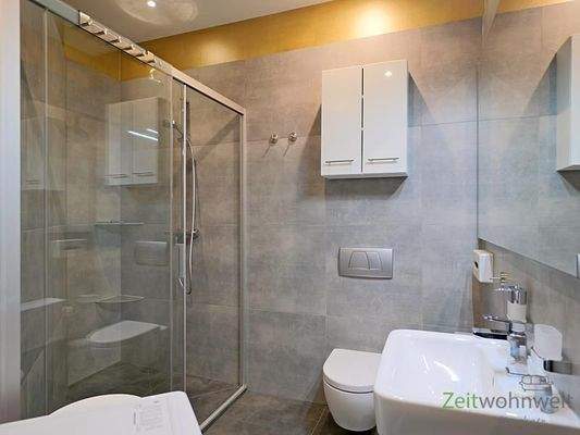 Bad mit bodentiefer Dusche