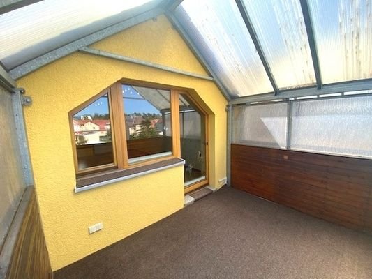überdachter Balkon