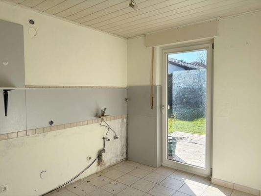 Platz für eine neue Küche mit Zugang zum Garten