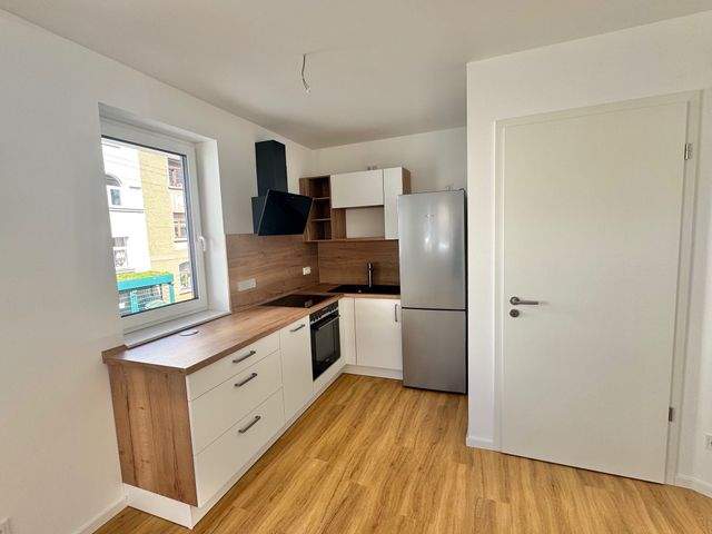 Erstbezug! Geräumige Zweizimmerwohnung unweit vom Stadtzentrum entfernt - Photo 3