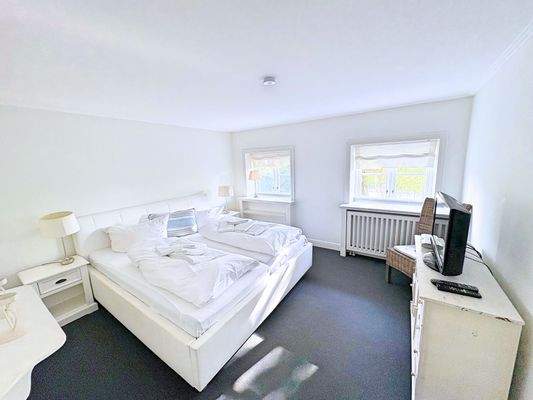 Schlafzimmer 2 im 1. OG