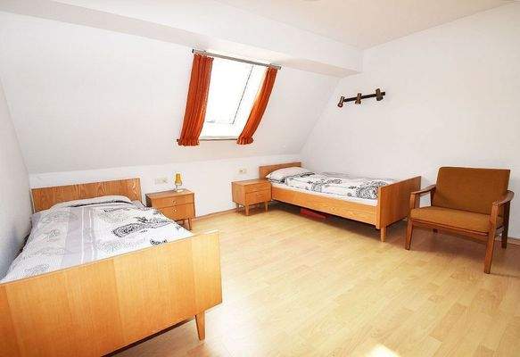 Eines von drei Kinderzimmern der oberen Wohnebene