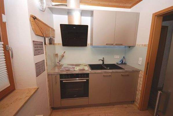 Küchenraum mit Einbauküche