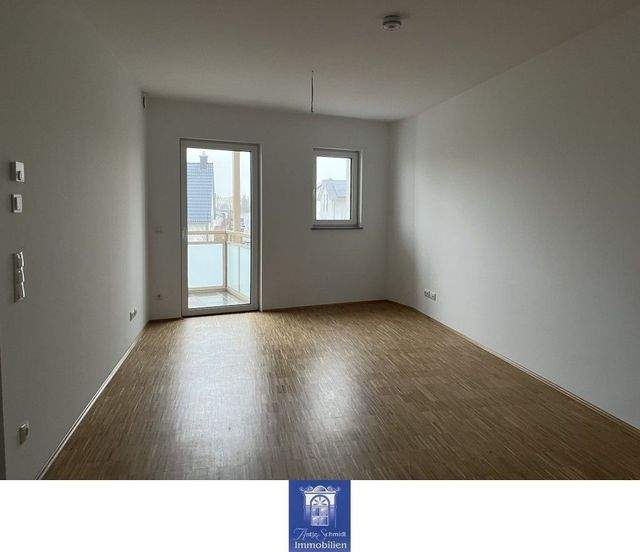 Gemütliche und hochwertige Neubauwohnung mit Balkon, EBK und Fußbodenheizung! - Photo 1