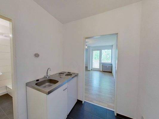 Ansicht II: Eingangsbereich mit Pantryküche