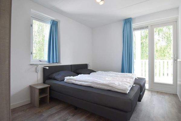 ferienwohnung-schlafzimmer-cap-helius-balcony-zuga