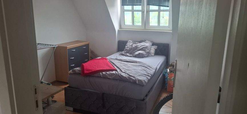 Schlafzimmer mit Doppelbett