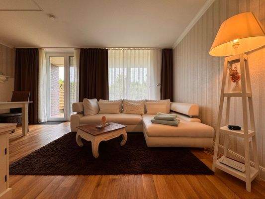 Wohnzimmer mit Schlafcouch 