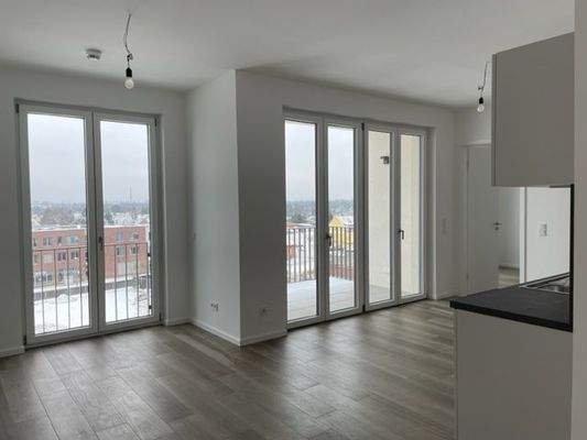 Wohnzimmer mit Balkon.jpg