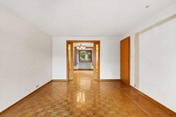 Wohnzimmer mit Esszimmerblick