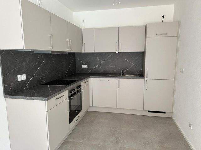 Helle 2-Zimmer-Wohnung mit Gartenanteil - Foto 1