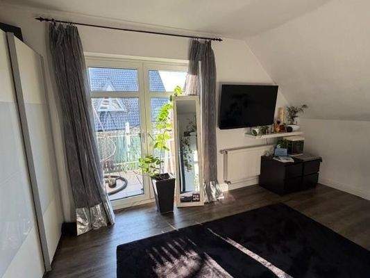 Schlafzimmer mit Balkon