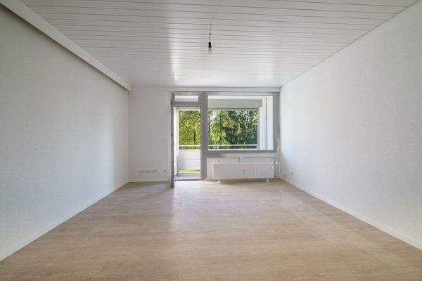 Wohnzimmer mit Ausgang auf den Balkon