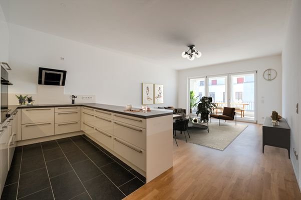 Open-plan living &amp; dining area with access to the 