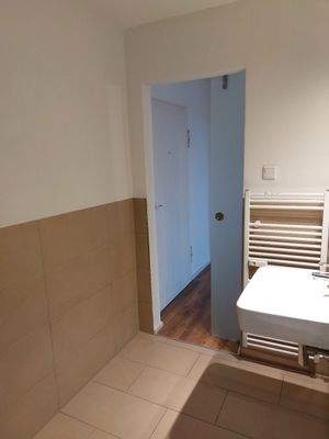 Glasschiebetür zum Bad