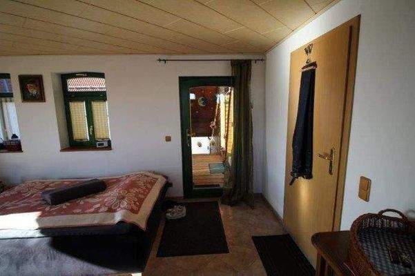 Kaminzimmer mir 2. Ausgang zur Hauseingangstreppe