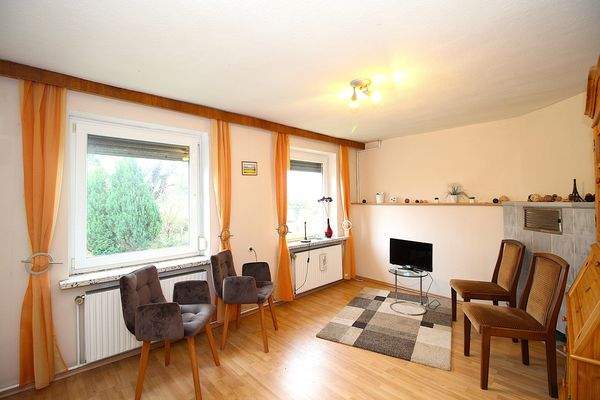 Wohnzimmer mit Kachelofen