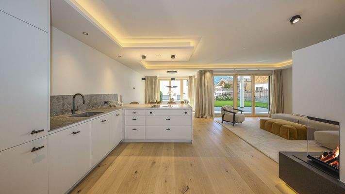 KITZIMMO-Luxuriöse Gartenwohnung mit eigenem Wellnessbereich - Immobilien Brixen.