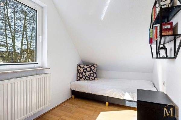 Schlafzimmer mit zwei Einzelbetten