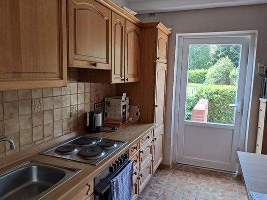 Küche mit Terrassenzugang