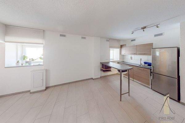 Wohnzimmer mit offener Küche (EG)