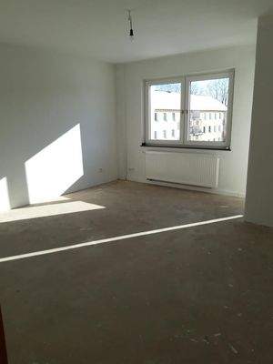 Wohnzimmer mit Balkon