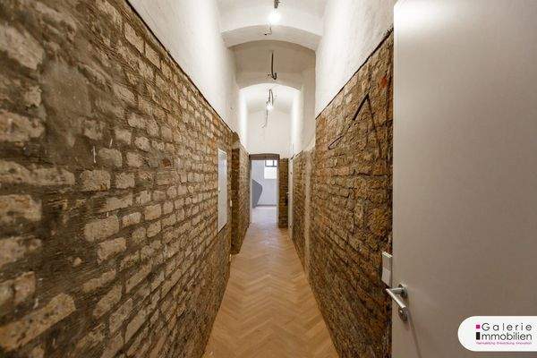 Gang zwischen dem straßen- und dem hofseitigen Raum