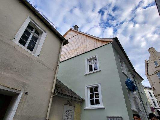 Rückansicht mit neuer Holzverschalung