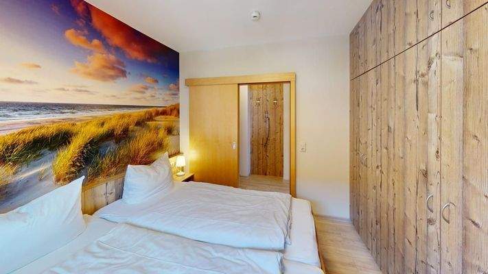 Schlafzimmer mit Wandbild