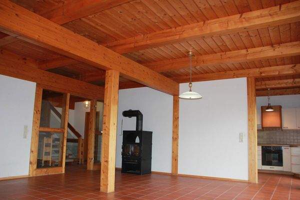 Wohn- und Essbereich mit Kamin