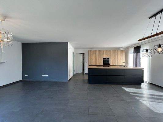 Wohn- und Essbereich mit integrierter Küche