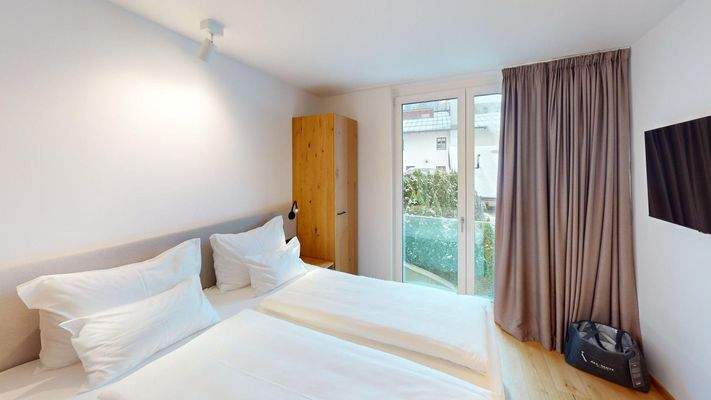 Apartment-201-ASR-FIEBERBRUNN-Bedroom 2.jpg