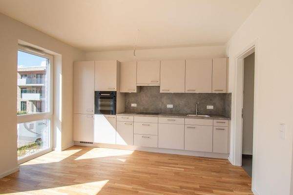 Wohn- und Esszimmer mit Küche