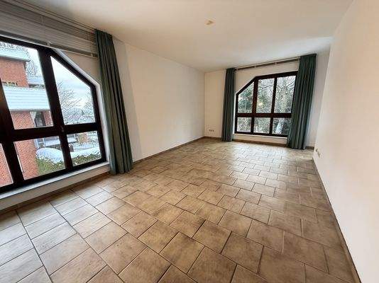 Wohnzimmer mit Balkon