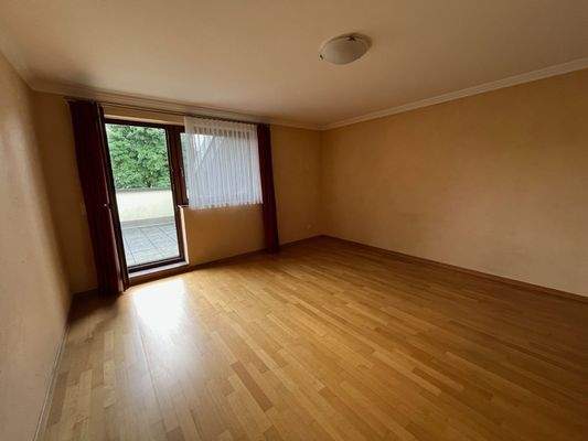 Schlafzimmer mit Zugang zur Terrasse