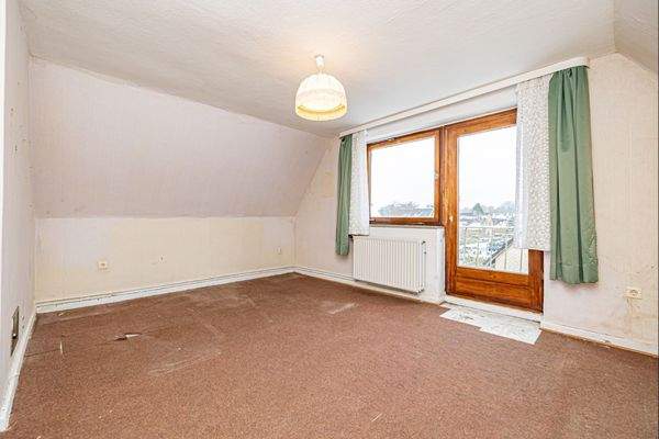 Dachgeschoss - Schlafzimmer mit Zugang zum Balkon