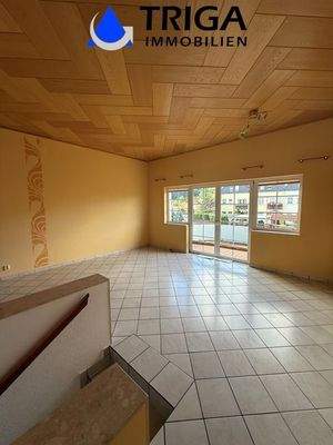 Wohnzimmer mit Balkon OG 